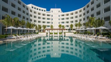 Outdoor pool, open 8 AM to 8 PM, pool umbrellas, pool loungers