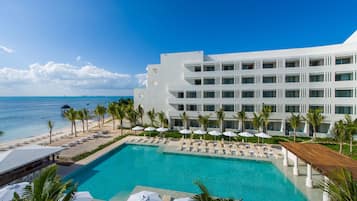 Outdoor pool, open 8 AM to 8 PM, pool umbrellas, pool loungers