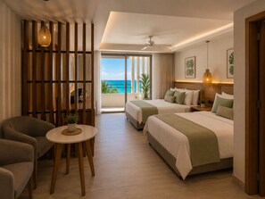 Suite junior, 2 camas matrimoniales | Ropa de cama de alta calidad y caja de seguridad en la habitación 
