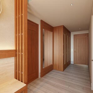 A hallway with wooden doors and a light-colored floor. - Devossion By Live Aqua Celebration Resort & Spa Isla Mujeres (Isla Mujeres)