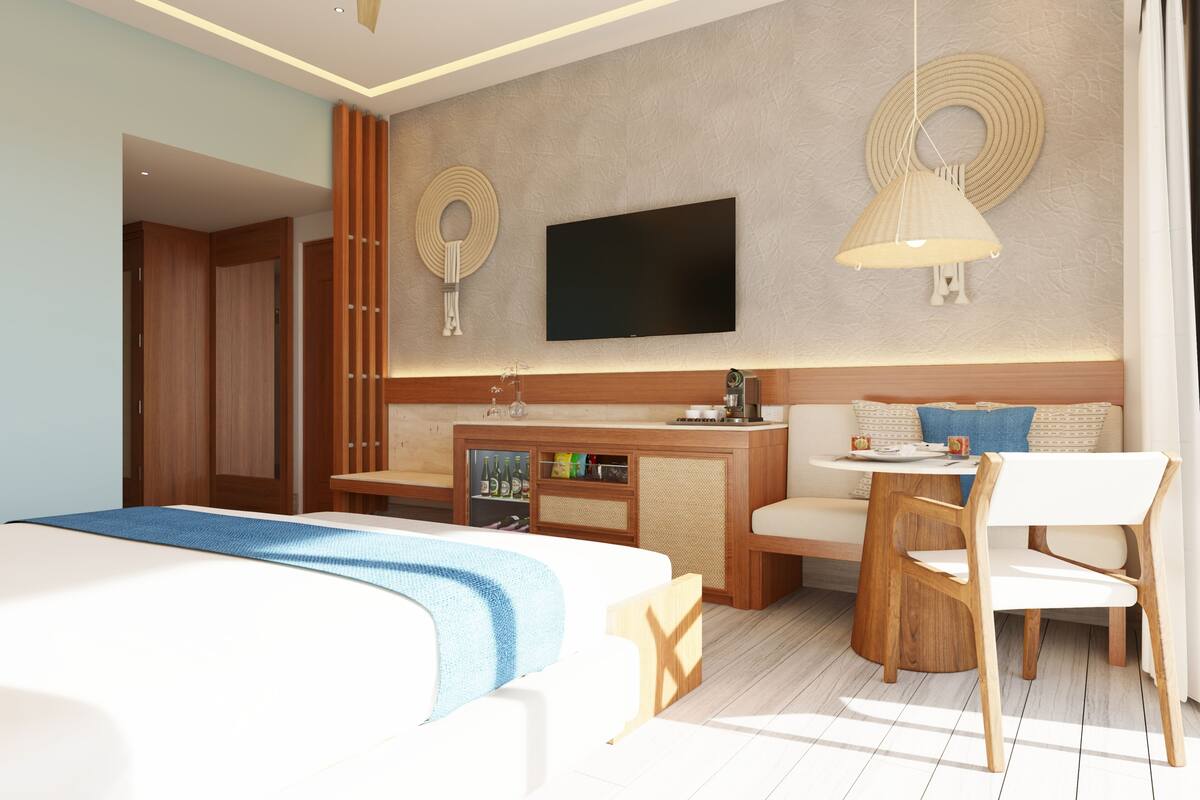 Habitación de lujo, 1 cama King size, vista al océano | Ropa de cama de alta calidad y caja de seguridad en la habitación