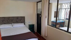 Basic Suite, 2 Bedrooms | Premium bedding, laptop workspace, WiFi (free), bed sheets - Casa Vista Hermosa (Quito)