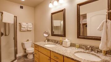 Combined shower/tub, hair dryer, towels, soap