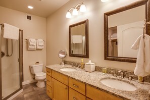 Combined shower/tub, hair dryer, towels, soap