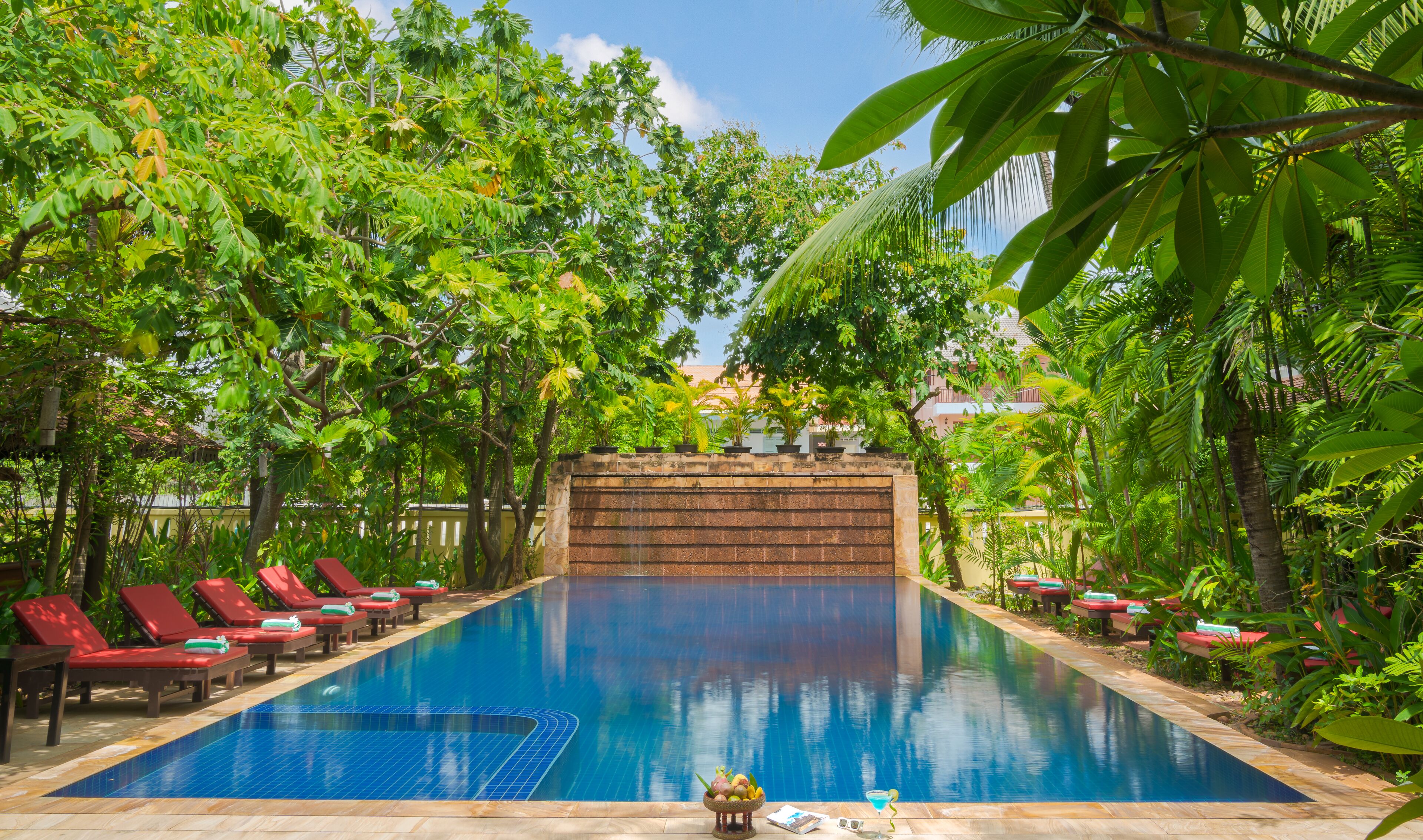 outdoor pool, open 7 am to 9:00 pm, pool umbrellas, pool loungers