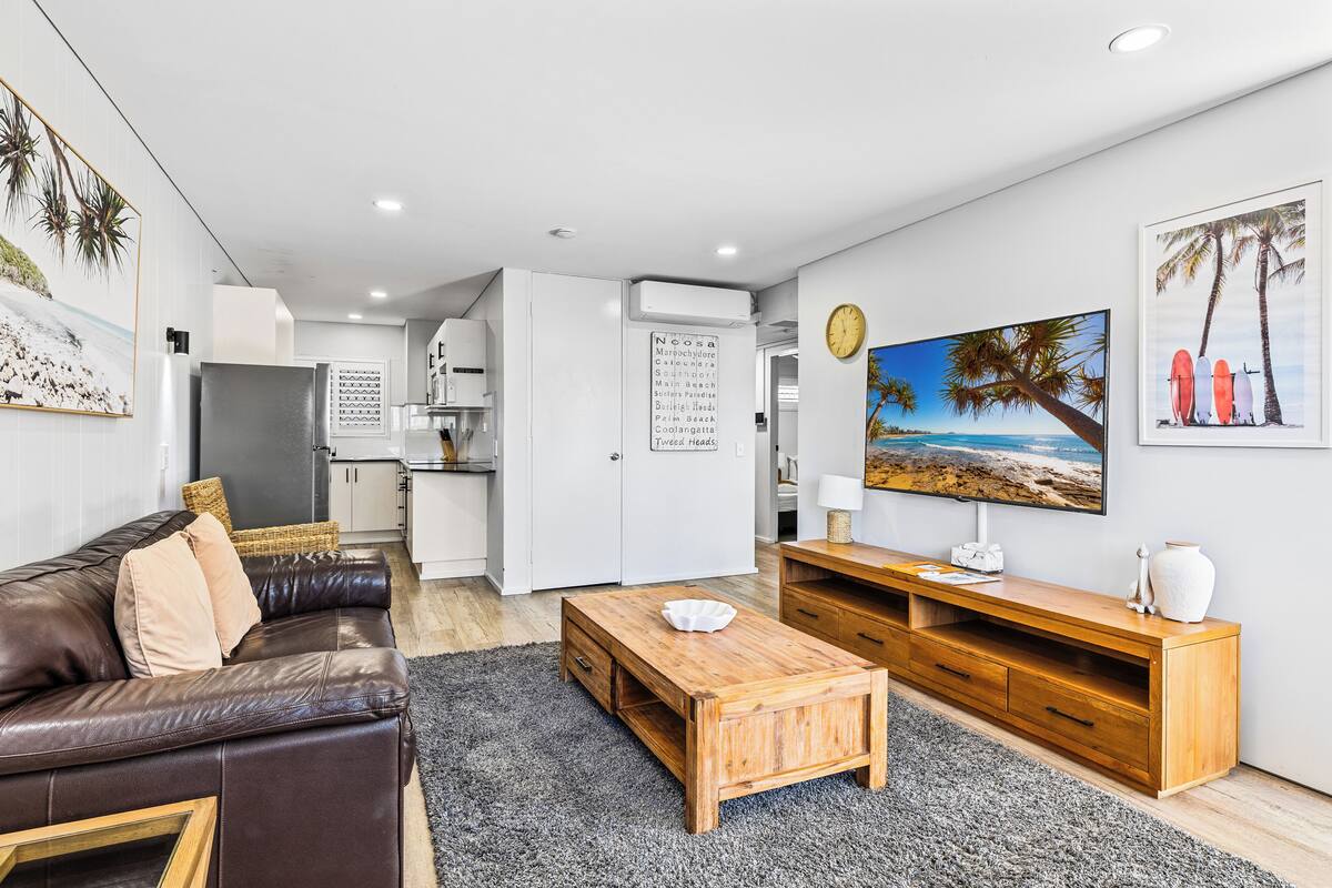 Superior Apartment | Living area | 55-inch flat-screen TV with digital channels, TV