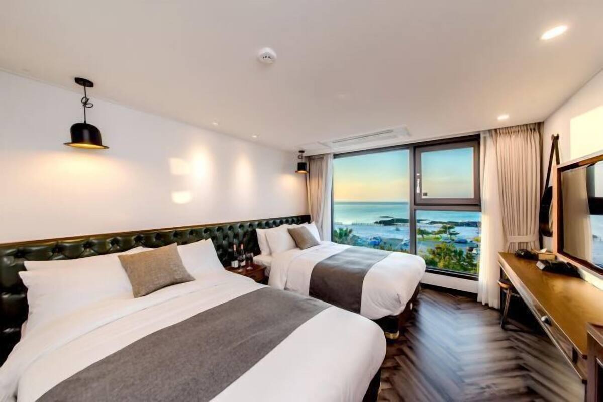 Premium bedding, desk, blackout curtains, soundproofing