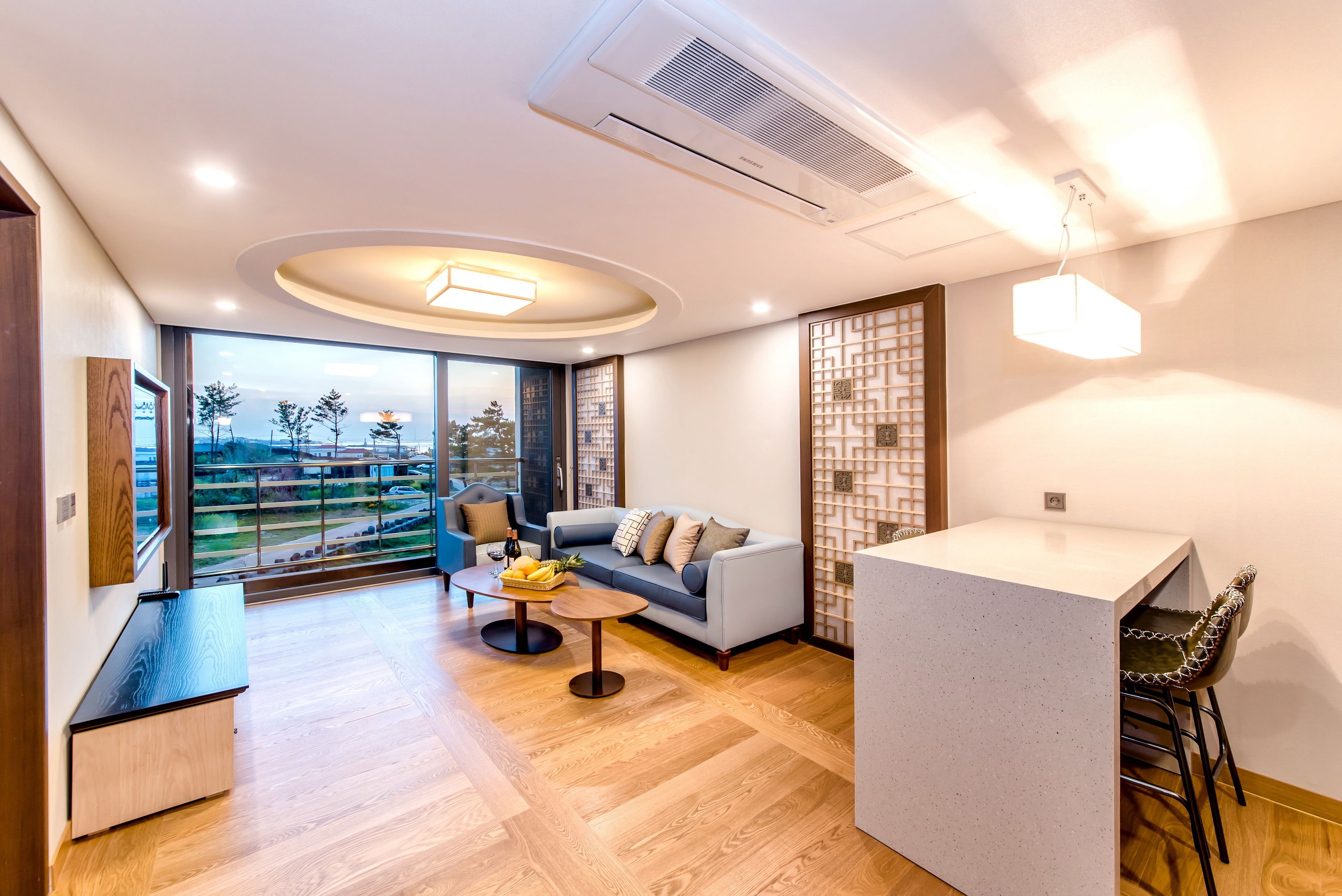 family suite twin, side ocean view | living area | 50-inch flat-screen tv with cable channels, tv