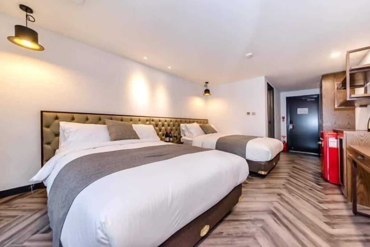 Premium bedding, desk, blackout drapes, soundproofing