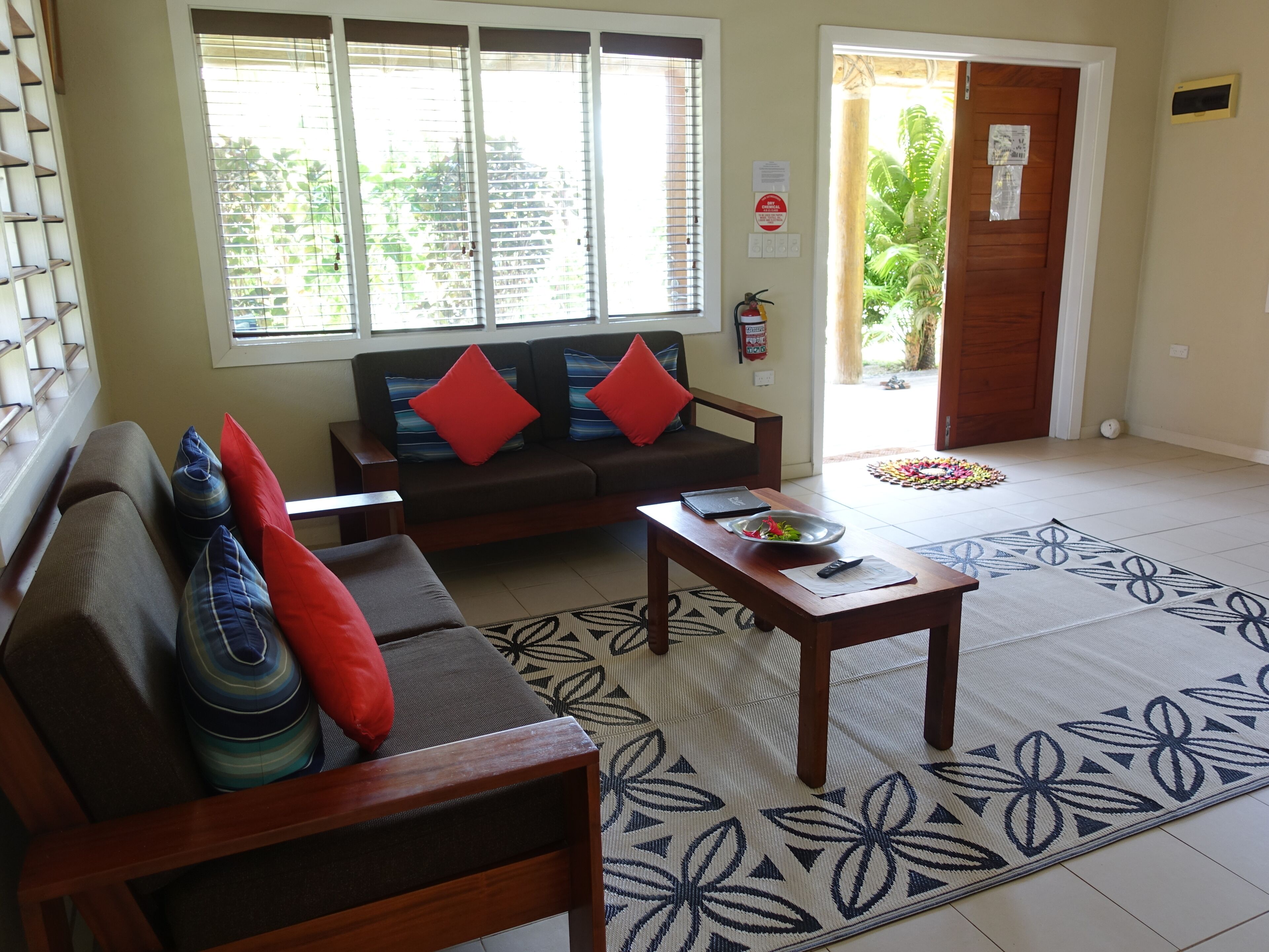 two bedroom garden villa | living area | 40-inch smart tv with digital channels, netflix, streaming services