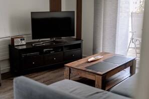 TV, DVD player, video library, stereo