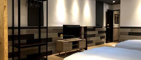 Deluxe Quadruple Room, Balcony | Down comforters, blackout drapes, soundproofing, rollaway beds