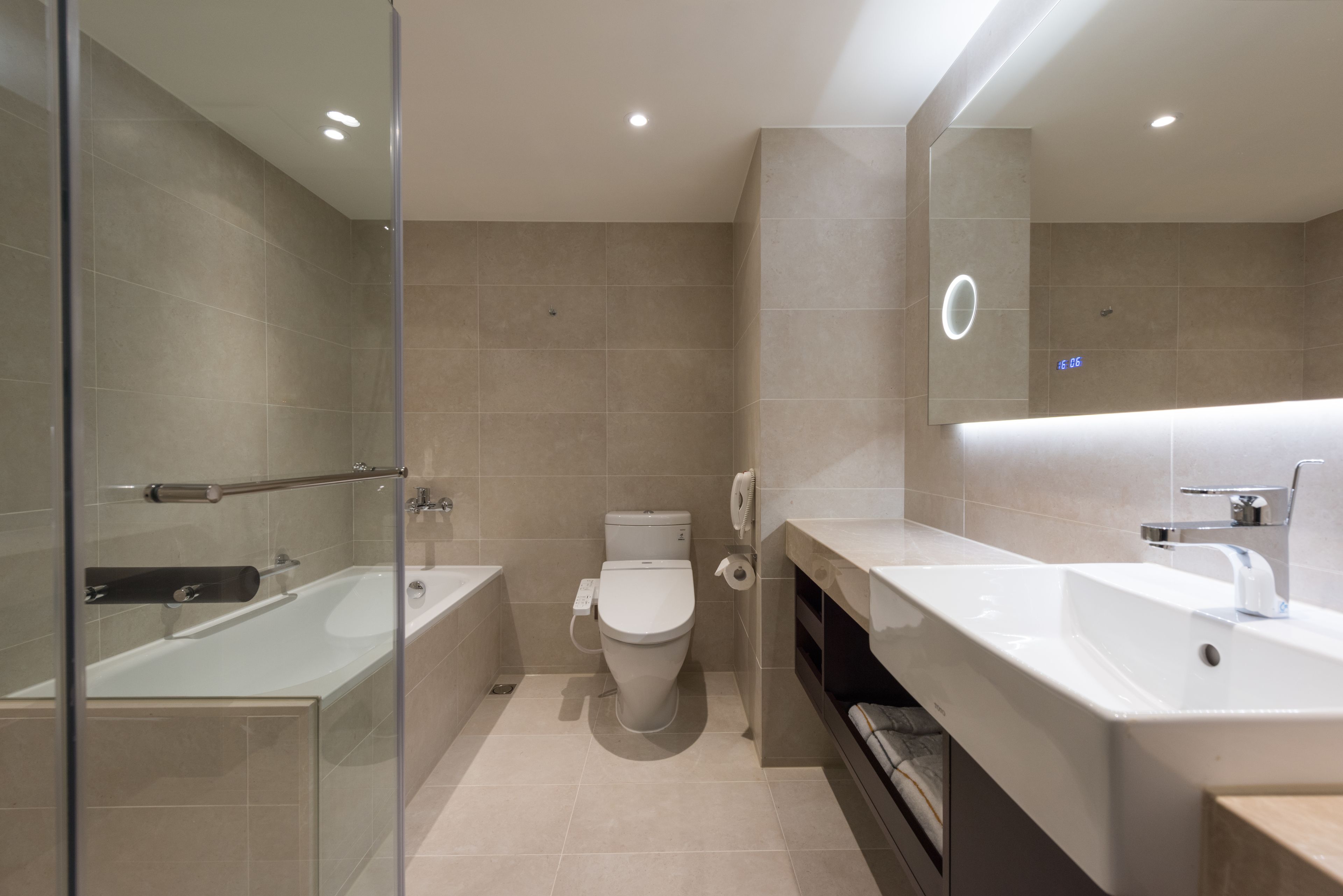 hair dryer, slippers, bidet, towels