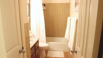 Hair dryer, towels, soap, shampoo