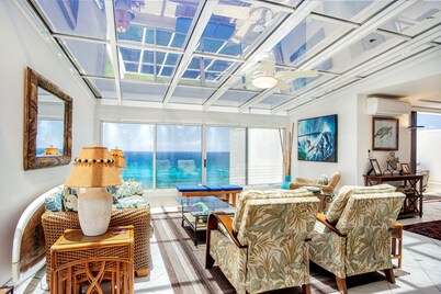 Experience Ultimate Oceanfront Luxury at Puu Poa Condo with a 5-star rating.