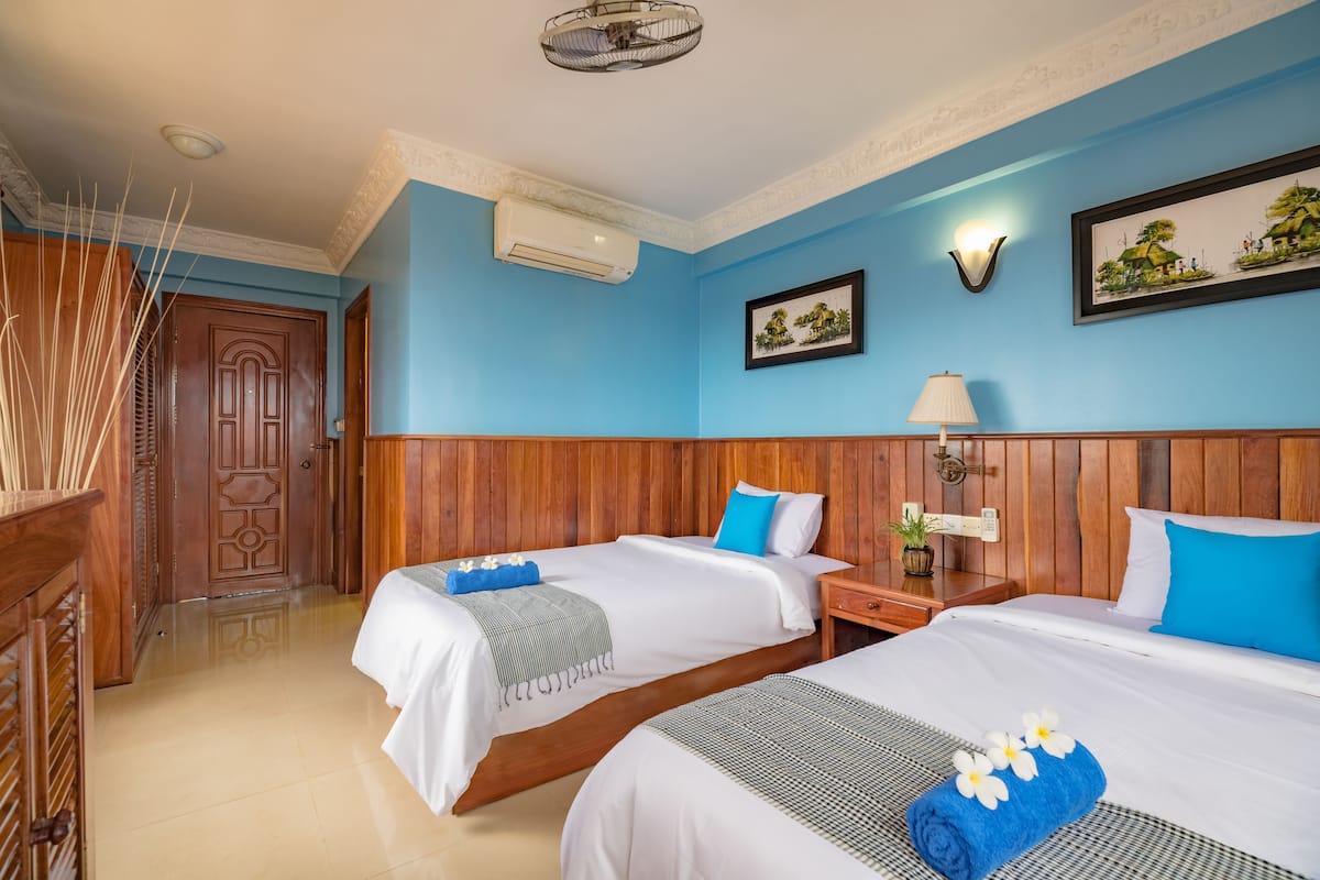 Habitación Deluxe con 2 camas individuales | Wifi gratis y ropa de cama