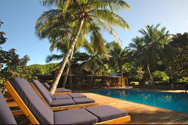 Outdoor pool, pool umbrellas, sun loungers