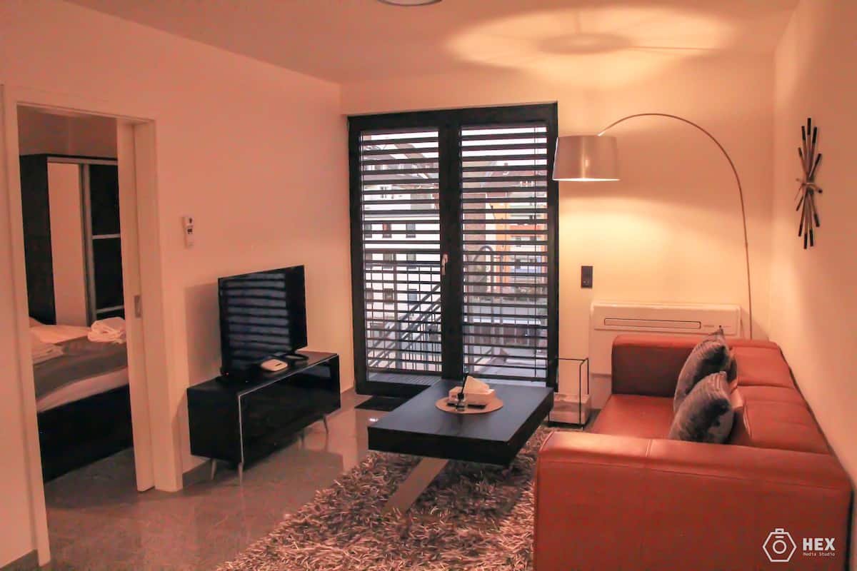 Superior Apartment, 1 Bedroom, Balcony | Living area | 40-inch Smart TV with premium channels, TV, Netflix