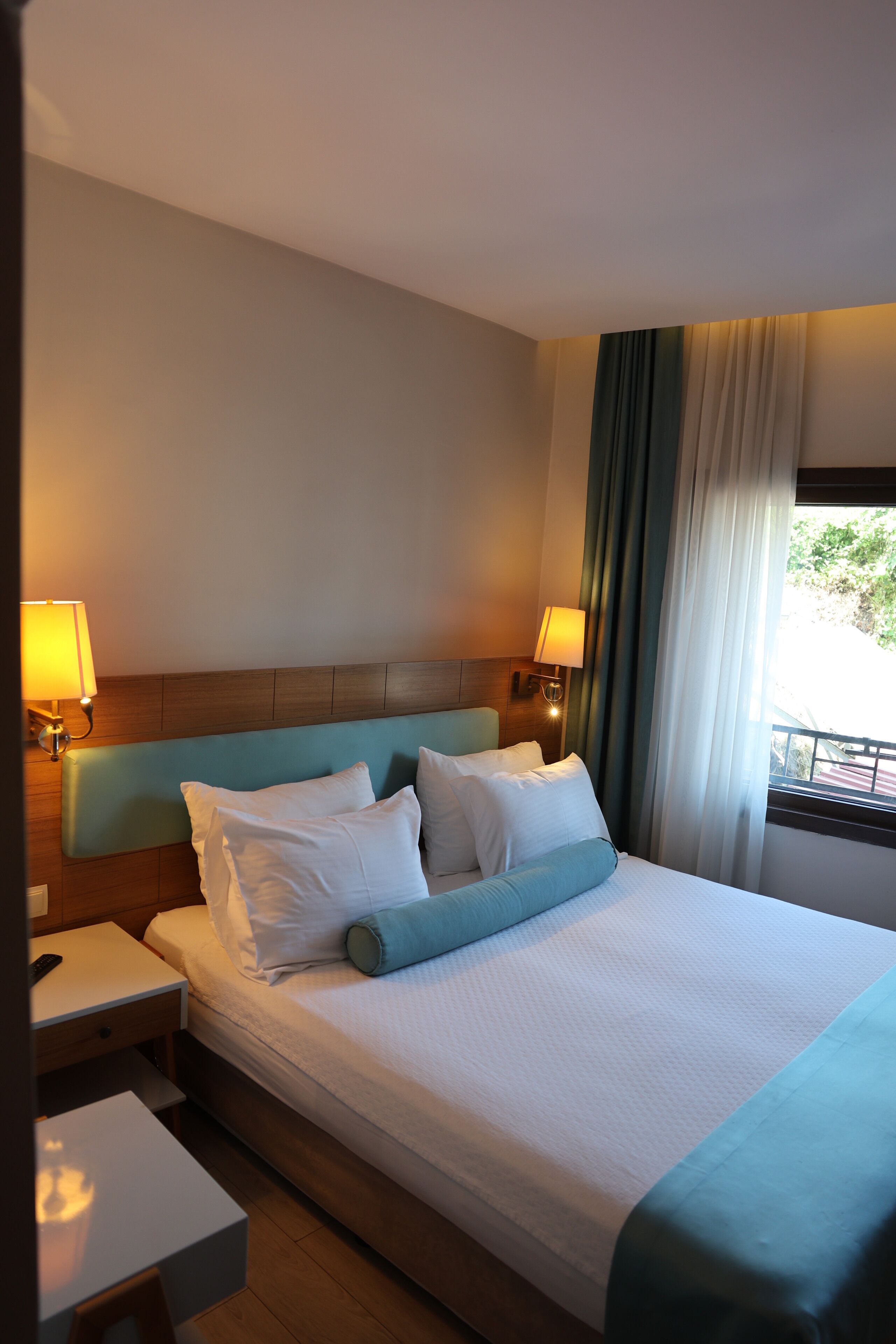 Standard Double Room, Garden View | Minibar, in-room safe, soundproofing, iron/ironing board