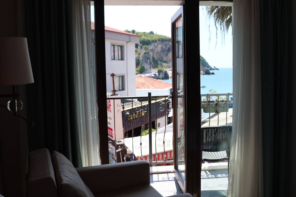 family suite, partial sea view | minibar, in-room safe, soundproofing, iron/ironing board