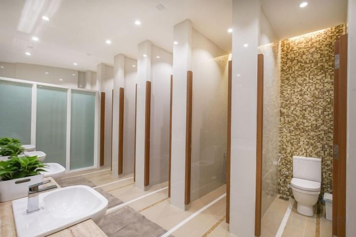 Shower, free toiletries, hair dryer, slippers