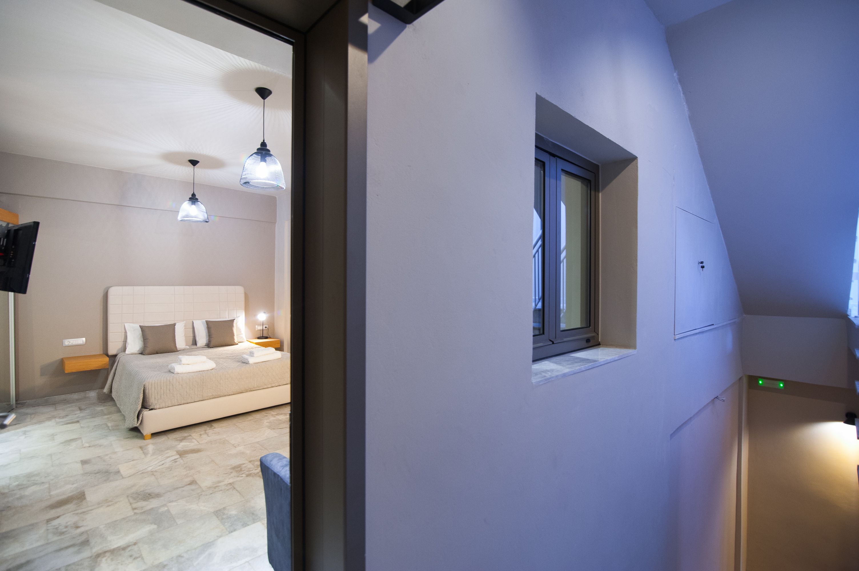 economy double room, no windows (facing the internal staircase) | minibar, in-room safe, desk, soundproofing