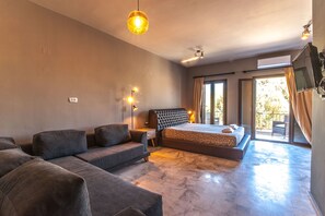 Triple Room, Balcony | Minibar, in-room safe, desk, soundproofing - Minoos Hotel (Chania)