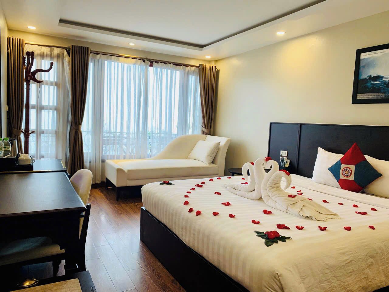 deluxe room, 1 double or 2 single beds, mountain view | minibar, in-room safe, desk, blackout curtains