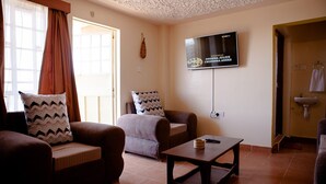 Apartment, 2 Bedrooms | Living area | Flat-screen TV - Oloiboni Hotel (Nairobi)