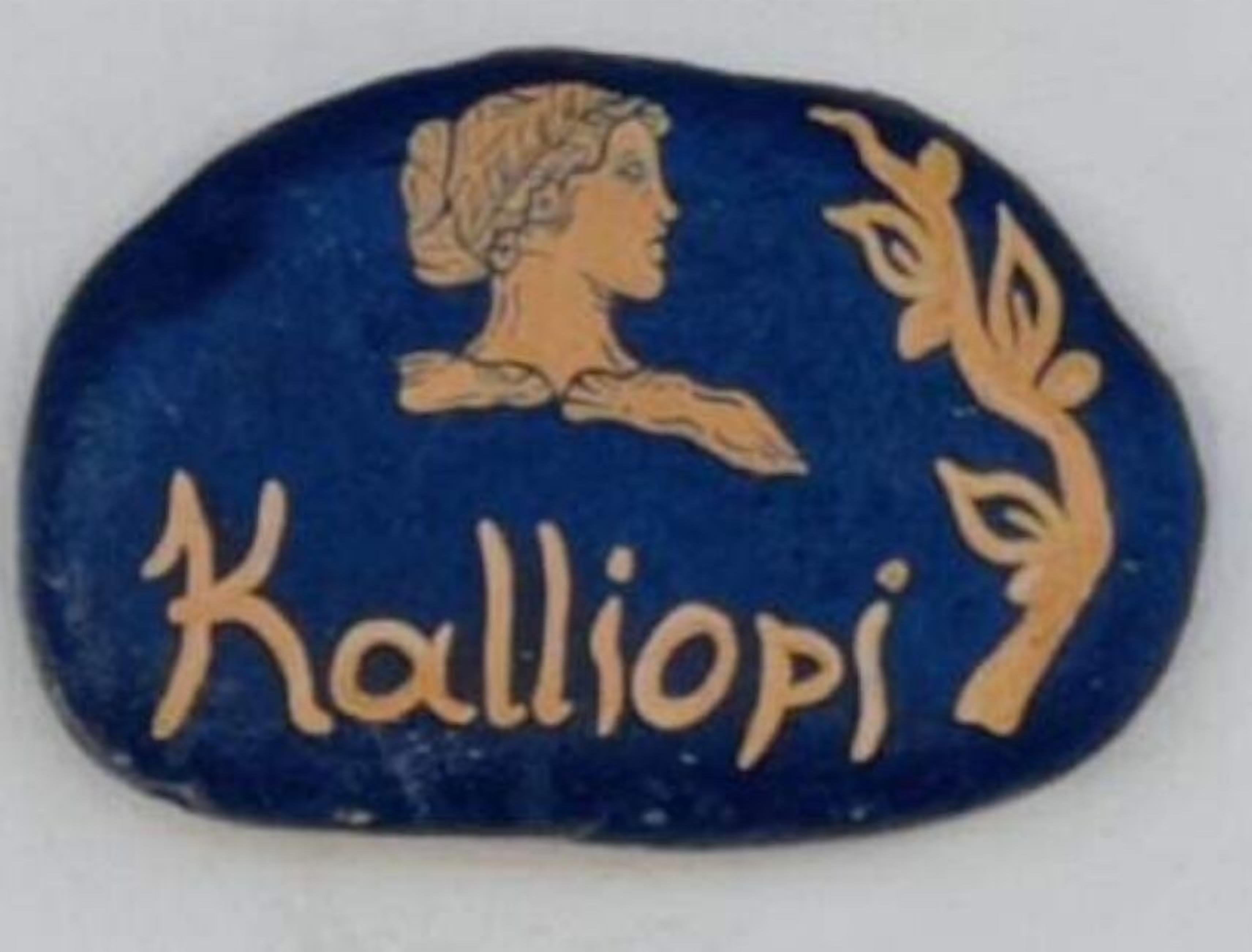 A stone with a carved profile of a woman and the word "Kalliope".