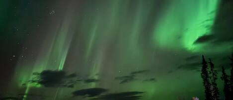 A hotel with a view of the Northern Lights.