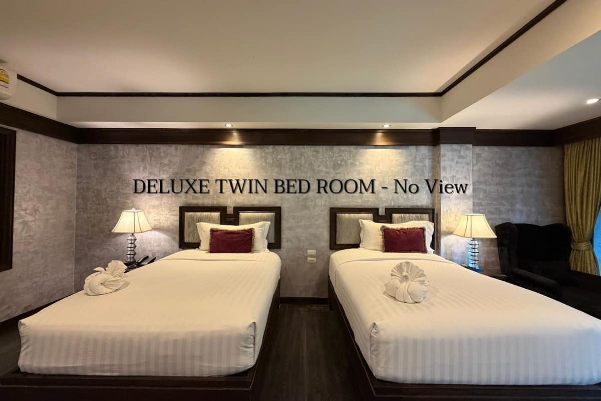 Quarto duplo luxo, no canto | Cofres nos quartos, Wi-Fi de cortesia, roupa de cama