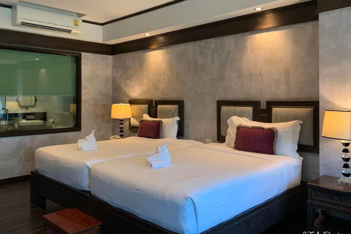 Deluxe-Zweibettzimmer | Zimmersafe, kostenloses WLAN, Bettwäsche