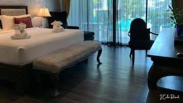 Deluxe Room, 1 Bedroom, Non Smoking, Pool View | In-room safe, free WiFi, bed sheets