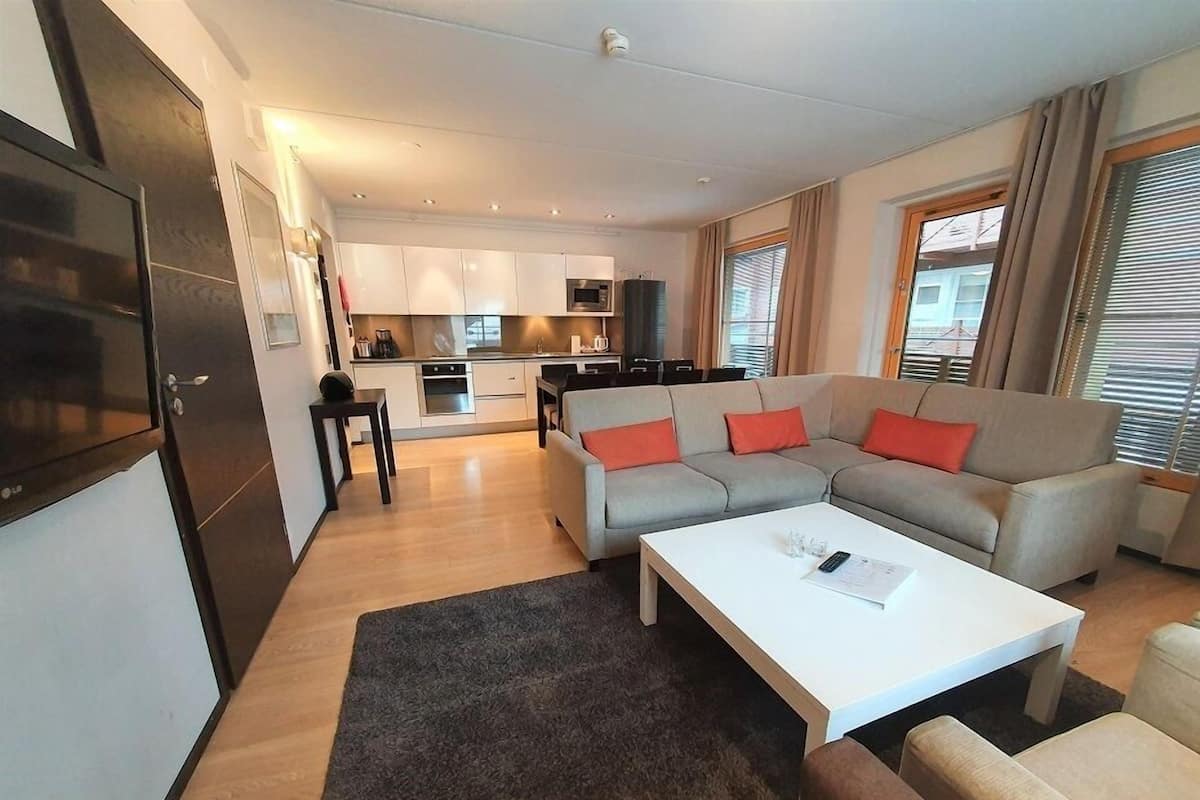 3-bedroom apartment A1 - with Sauna, Mountain View | Woonruimte | Een flatscreentelevisie en vloerverwarming