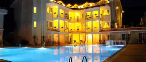 2 outdoor pools, pool umbrellas, pool loungers