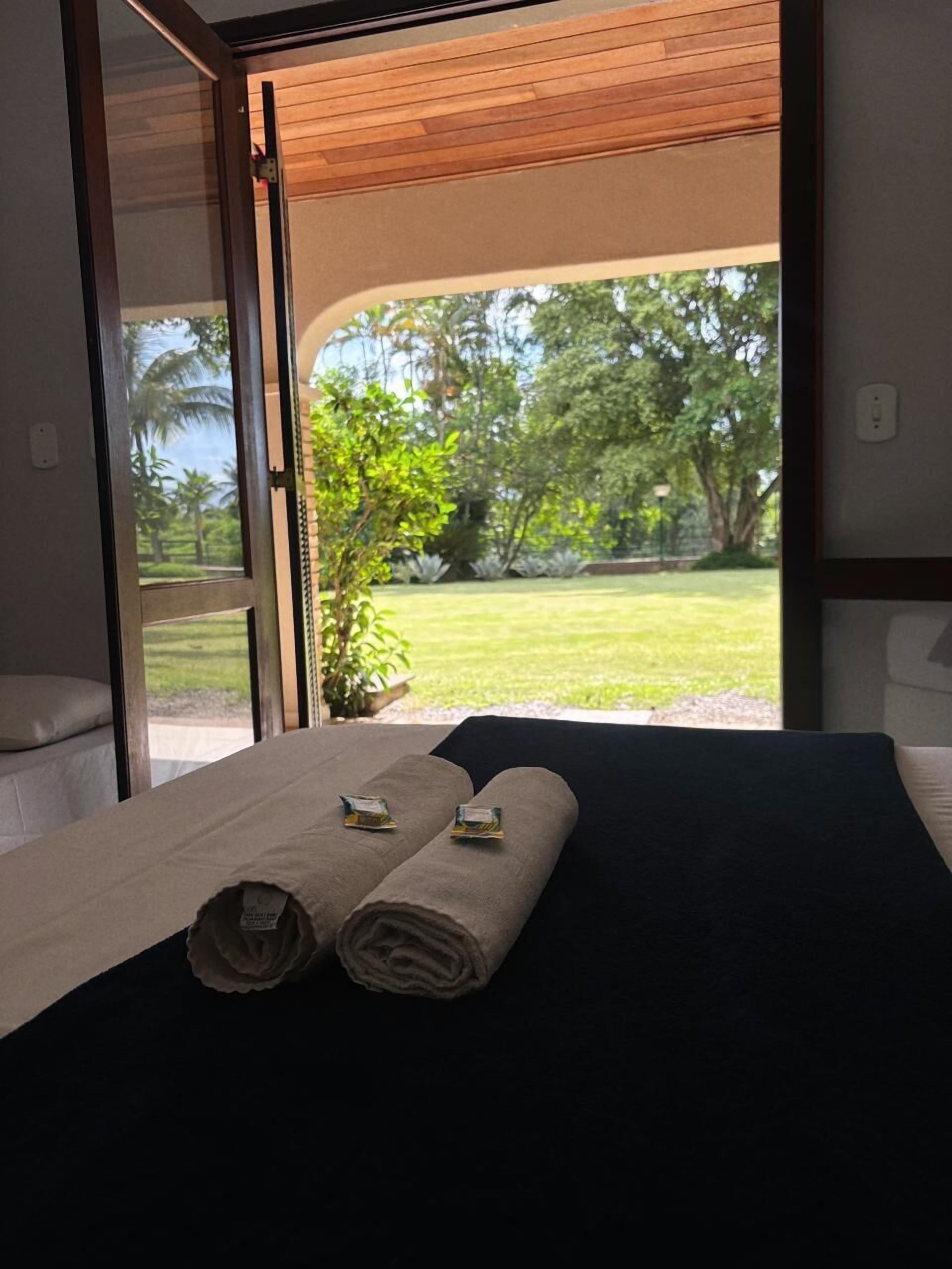 Quarto triplo standard | Frigobar, roupa de cama