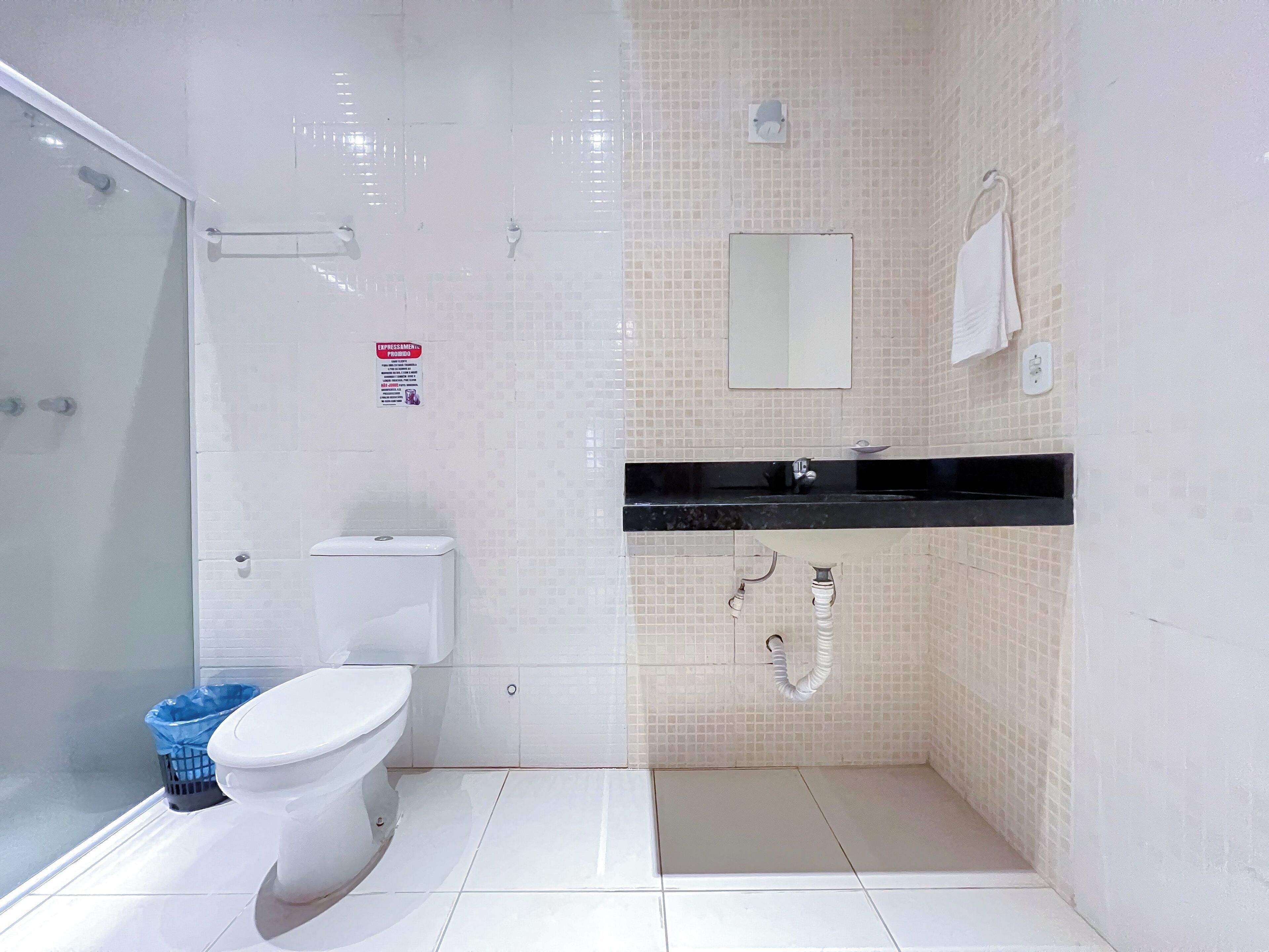 standard double room | bathroom | shower, hair dryer, towels