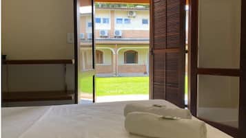 Quarto quádruplo standard | Frigobar, roupa de cama