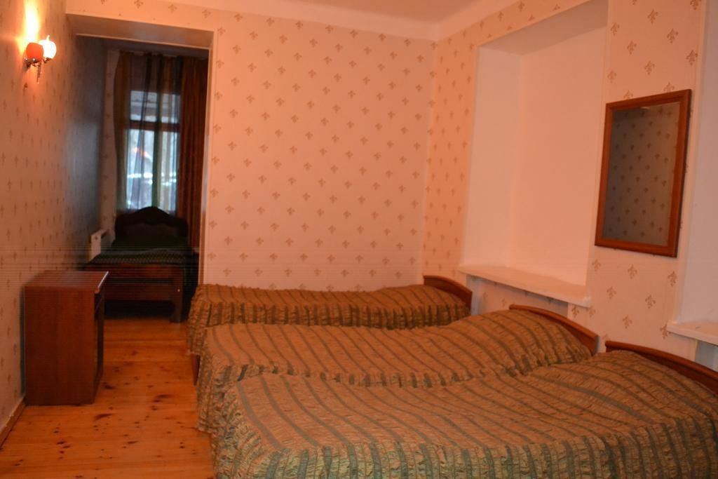 Standard Triple Room | Iron/ironing board, free cots/infant beds, rollaway beds, free WiFi
