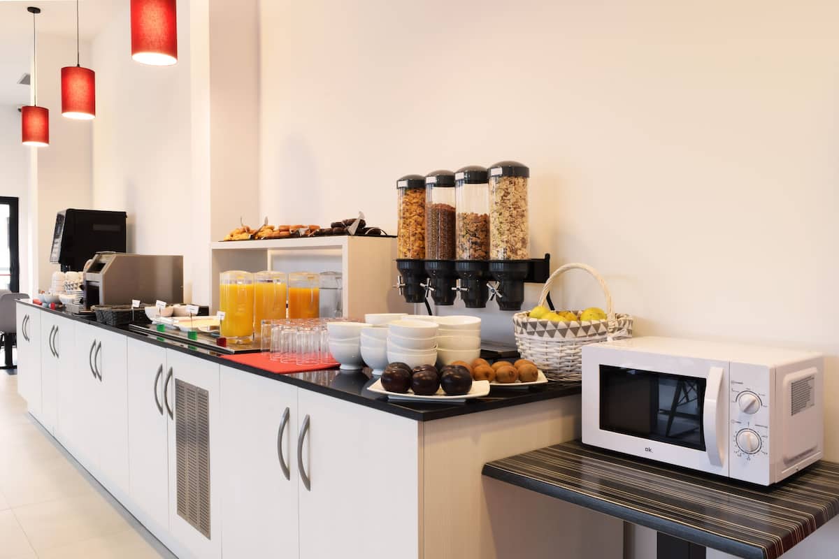 daily buffet breakfast (eur 8 per person)