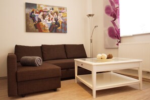 Classic Apartment, 1 Bedroom, Kitchen, Garden View (2) | Living area | Flat-screen TV