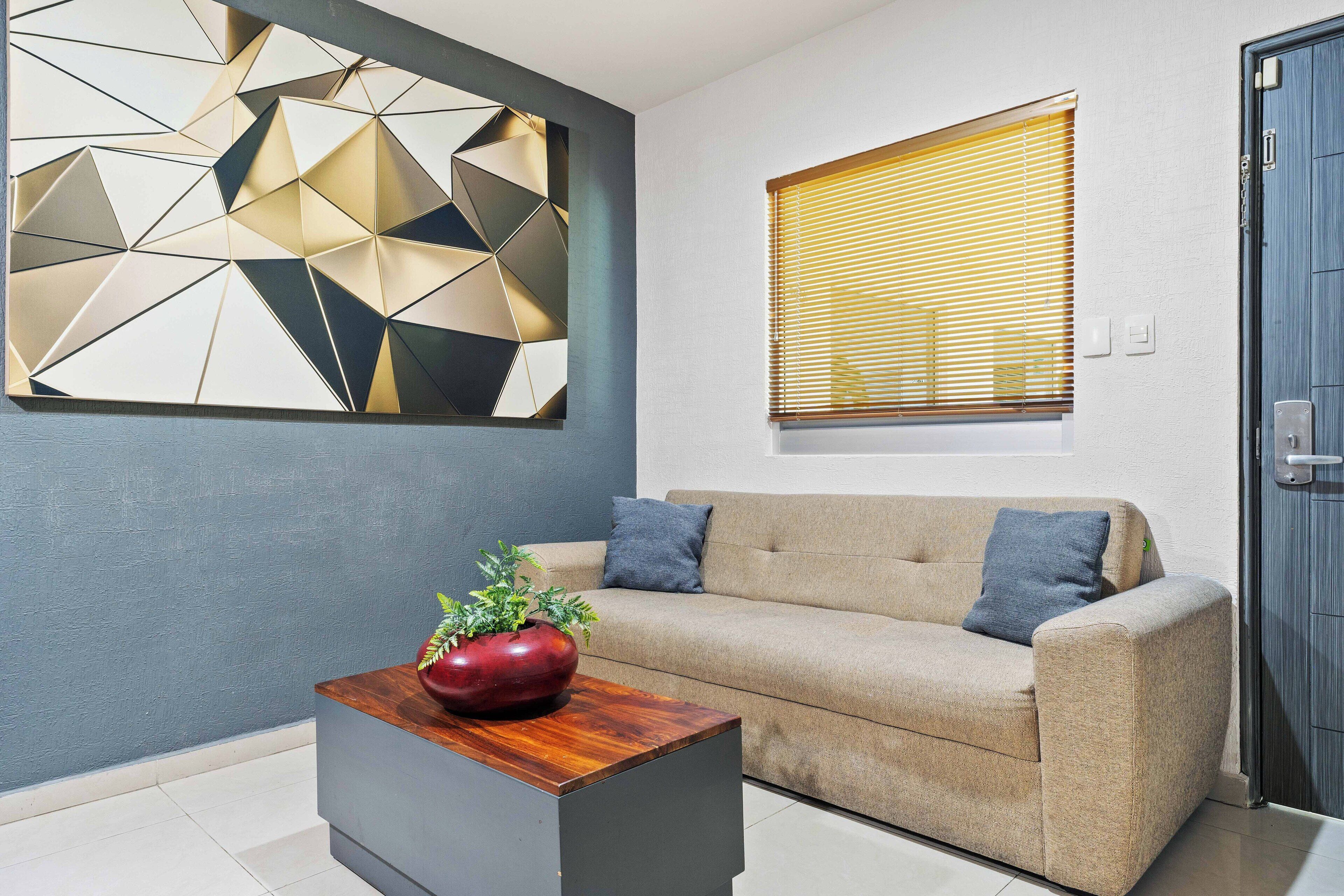 suite, 2 double beds | living area | 40-inch smart tv with cable channels, netflix, streaming services