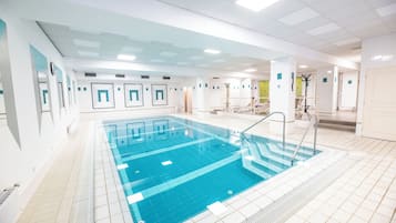 Indoor pool, open 7:30 AM to 9:00 PM, pool umbrellas, pool loungers