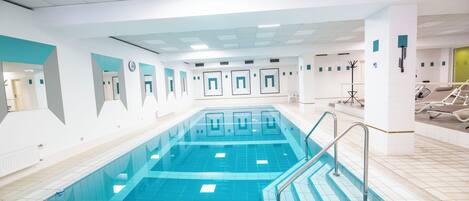 Indoor pool, open 7:30 AM to 9:00 PM, pool umbrellas, pool loungers