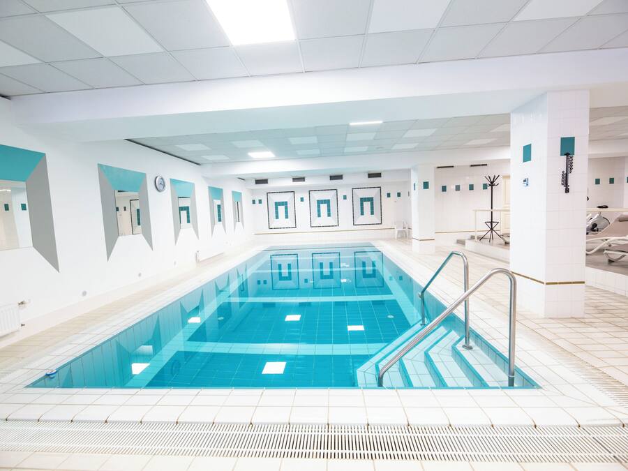 Indoor pool, open 7:30 AM to 9:00 PM, pool umbrellas, pool loungers