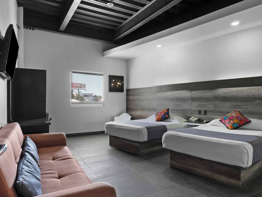 Suite, Multiple Beds | Hypo-allergenic bedding, desk, iron/ironing board, free WiFi