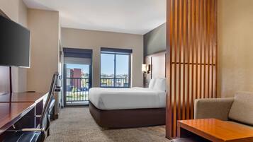 Suite, 1 King Bed, Non Smoking, Balcony | Premium bedding, desk, laptop workspace, iron/ironing board