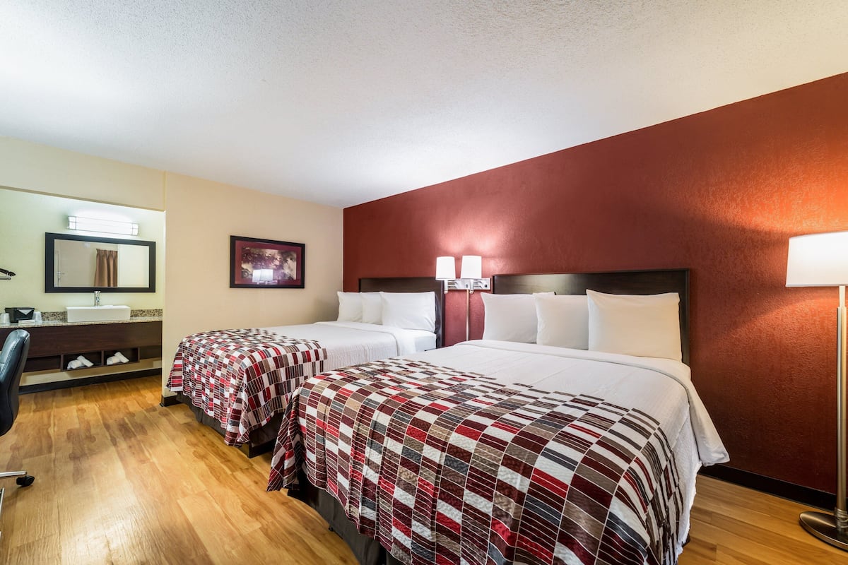 Deluxe Room, 2 Queen Beds, Non Smoking | Desk, blackout drapes, cribs (free), WiFi (free)