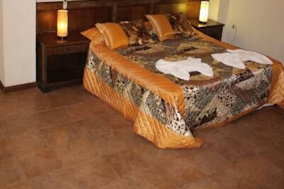 Family Room (5 people) | Desk, blackout curtains, iron/ironing board, rollaway beds